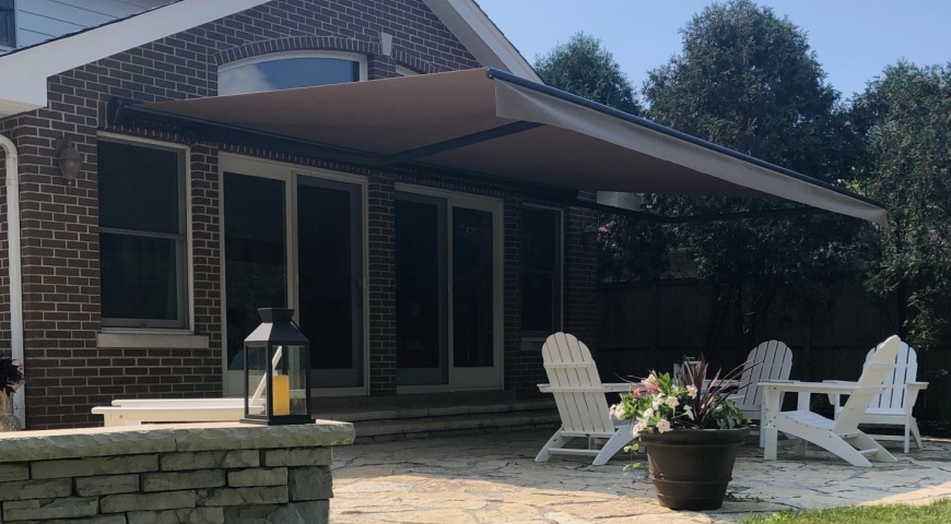 Awning fully extended over back patio