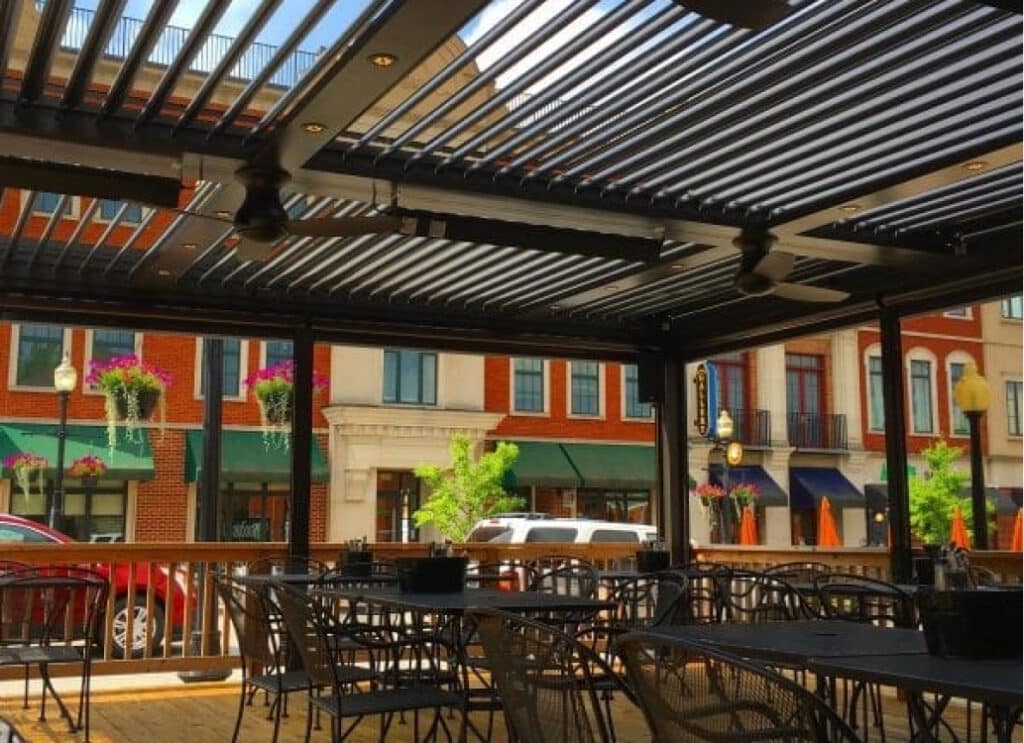 Louvered pergola with fans at restaurant