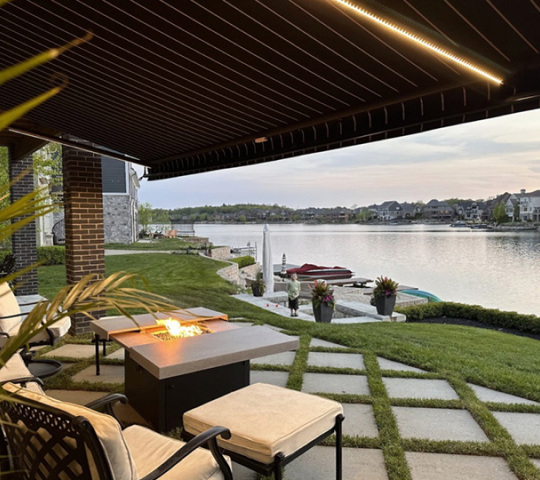 awning extended out with LED lights on next to a lake