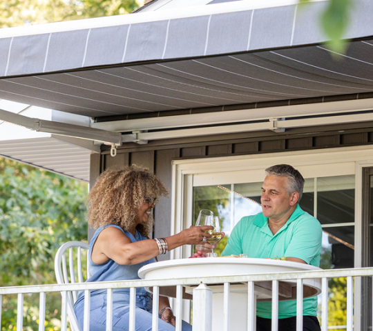 Couple underneath an awning