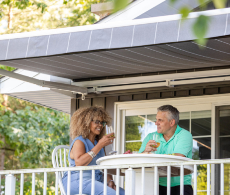 couple spending time together underneath an awning