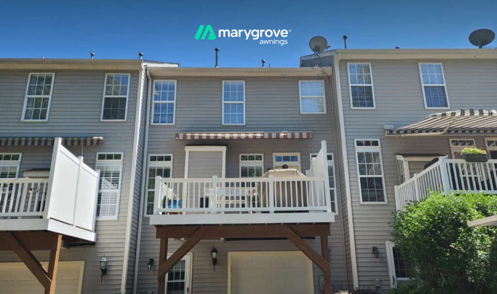 Marygrove retractable awning installed above a balcony on a multi-story townhouse.